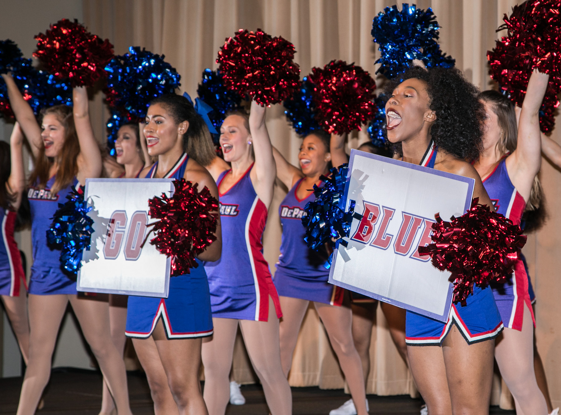 Members of the DePaul University Dance and Cheer Teams warm up the crowd during the Family Weekend Kickoff party. (DePaul University/Jamie Moncrief)